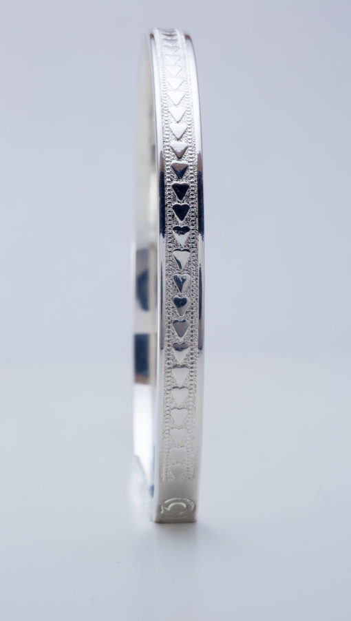 silver bracelet with hearts vertical